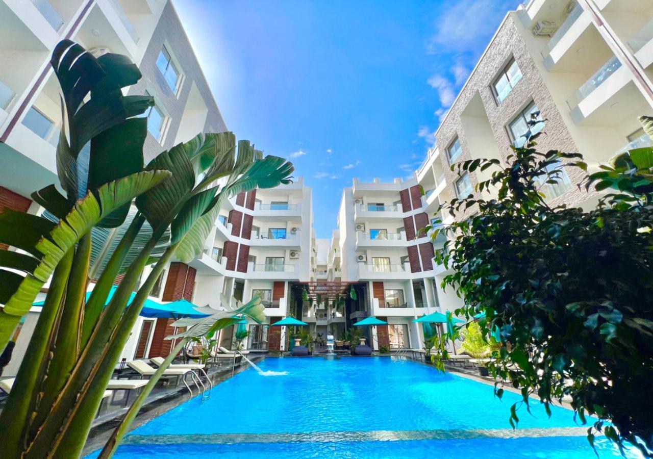 Sanctuary Sunlit Hurghada Haven With 4 Pools, Rooftop Sunsets & Gourmet Bites Steps Away ภายนอก รูปภาพ