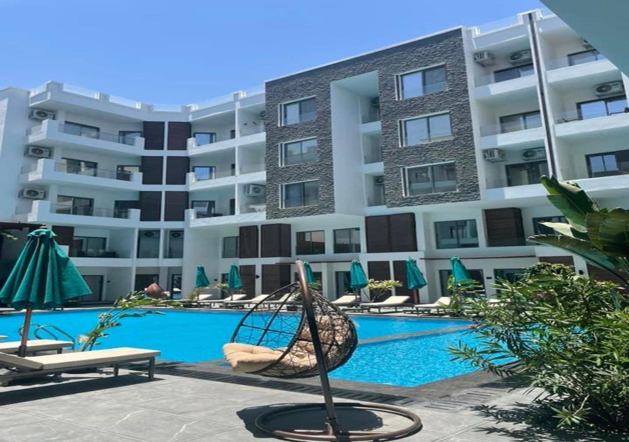 Sanctuary Sunlit Hurghada Haven With 4 Pools, Rooftop Sunsets & Gourmet Bites Steps Away ภายนอก รูปภาพ