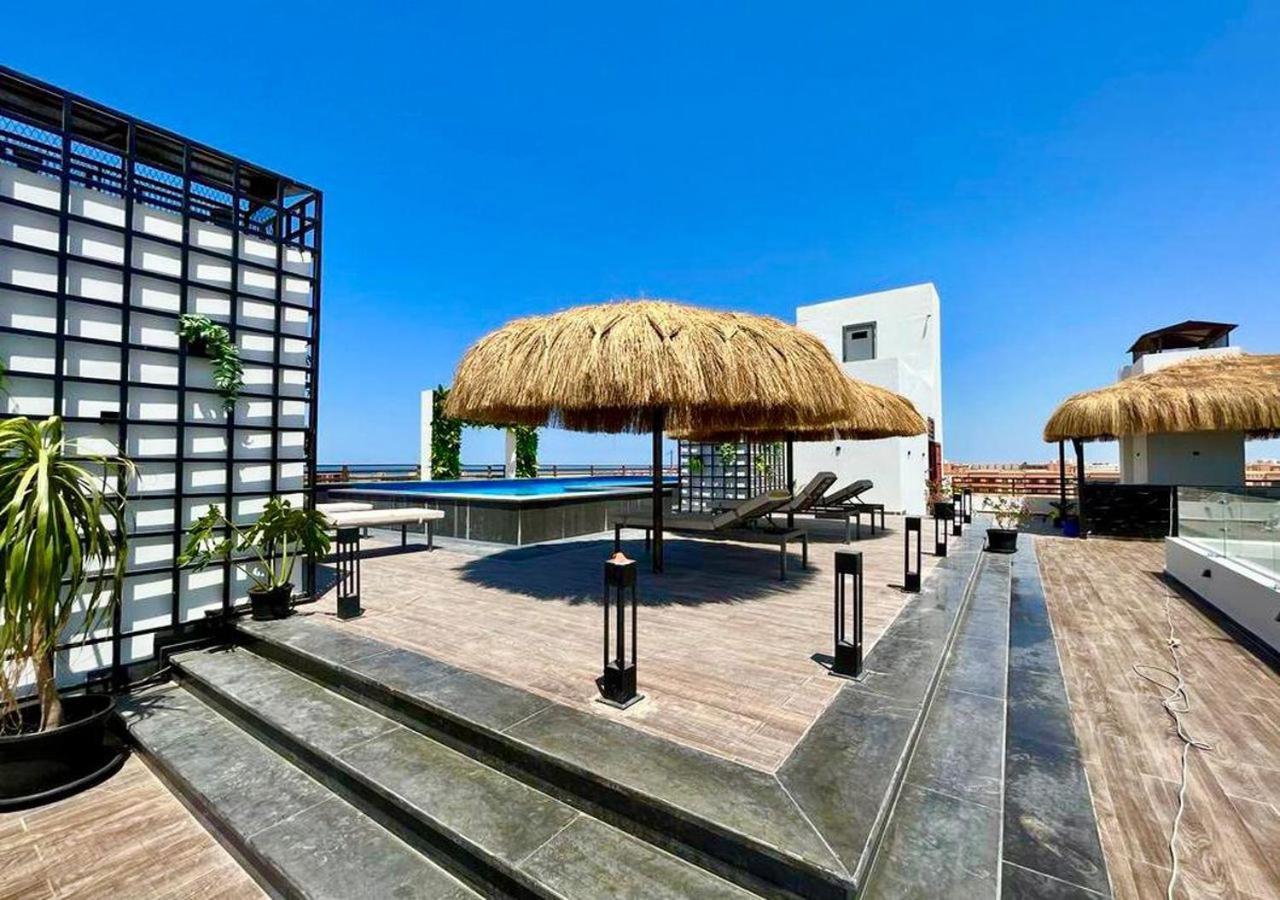 Sanctuary Sunlit Hurghada Haven With 4 Pools, Rooftop Sunsets & Gourmet Bites Steps Away ภายนอก รูปภาพ